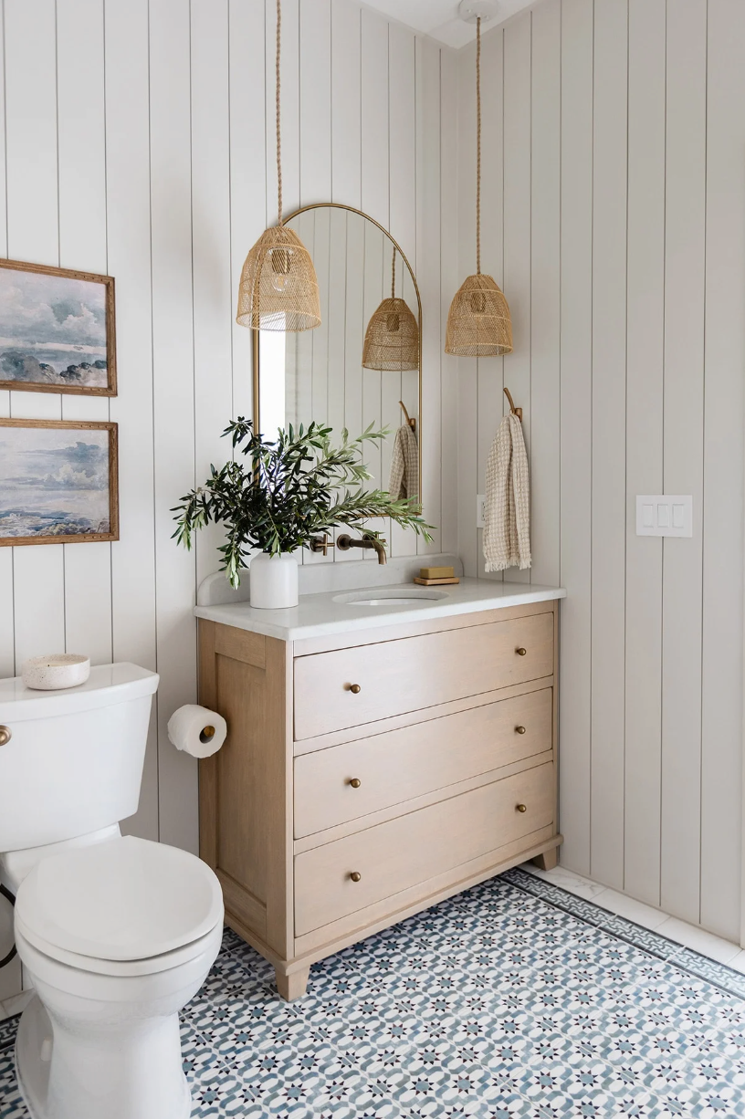 modern bathroom featuring natural elements and decorative fixtures