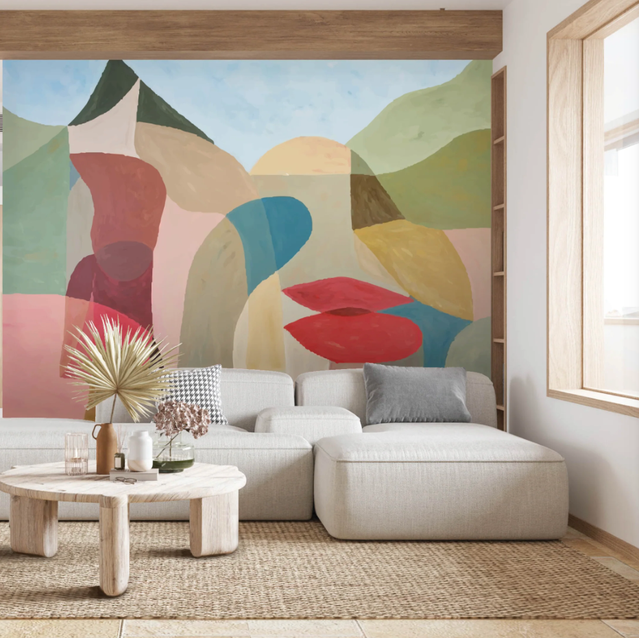 interior setting featuring a modern sofa and a vibrant mural