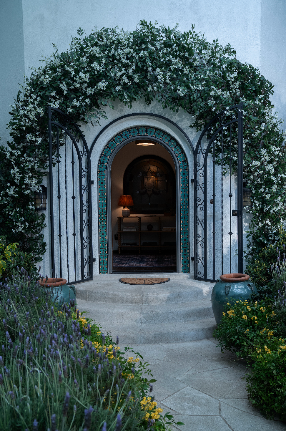 Arched door with tiles on a house without a good deed