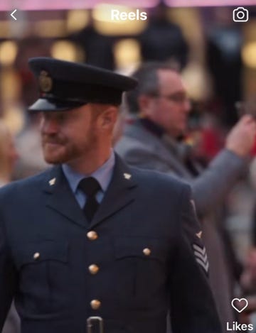 a uniformed officer in a public setting