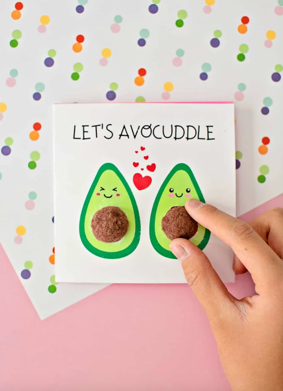 greeting card featuring avocados with smiley faces and a playful theme