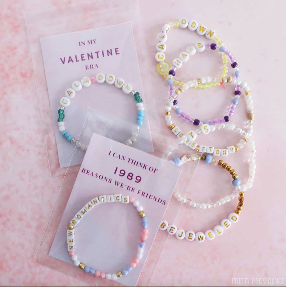 colorful beaded bracelets with tags referencing friendship and taylor swifts themes