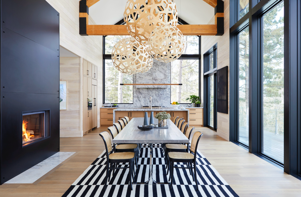 a frame chalet in collingwood, ontario designed by by sarah richardson design and murakami design great room rug ikea chairs design within reach table custom flooring european oak, northern wide plank paint white dove, benjamin moore