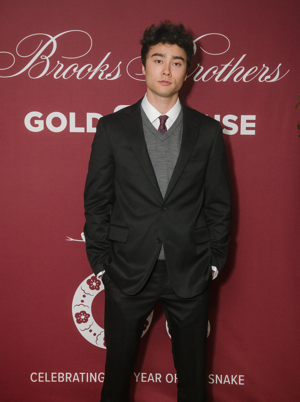 Joe Ando at Brooks Brothers event formal event attire against branded backdrop