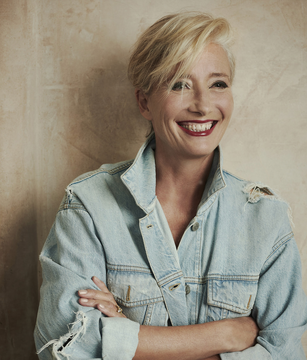 portrait featuring a person wearing a denim jacket with a neutral background