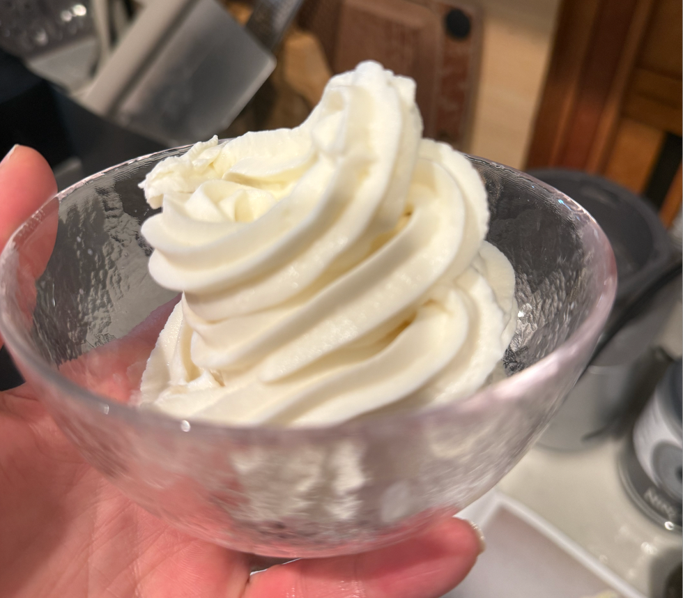 swirled soft serve ice cream served in a glass cup