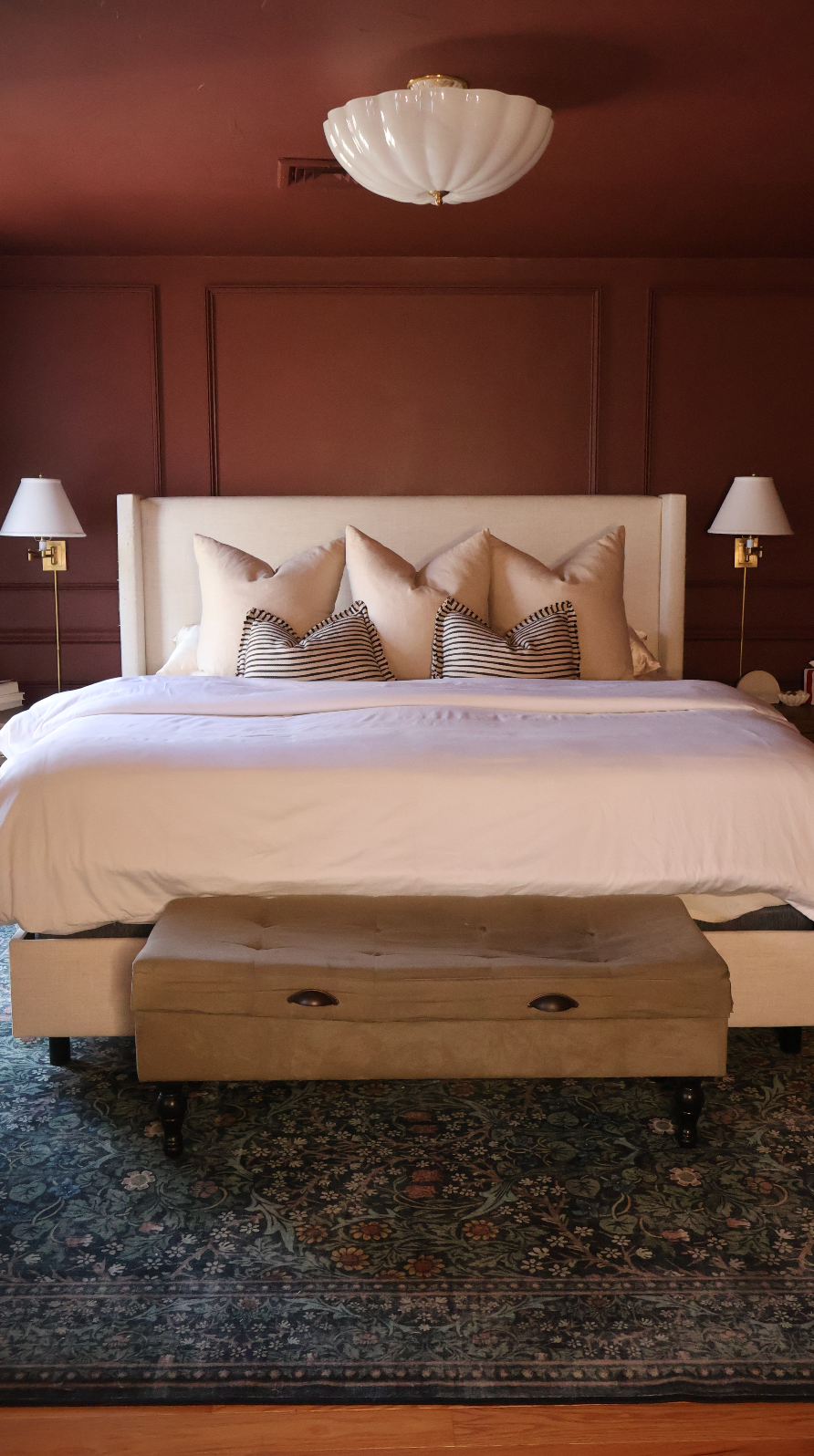 color drenching bedroom with rusty red walls