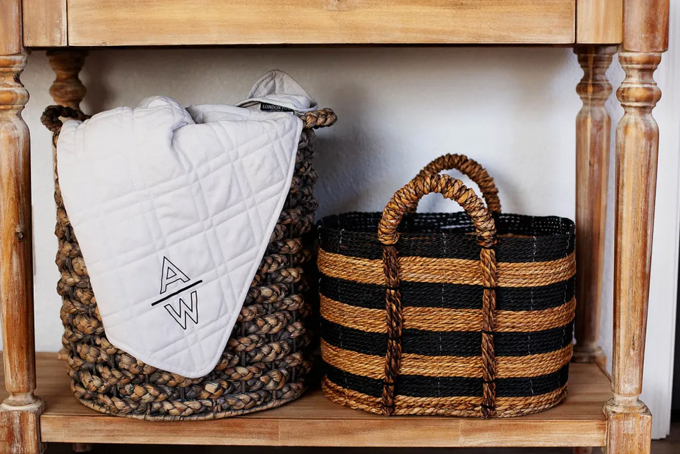 storage baskets with a blanket on top