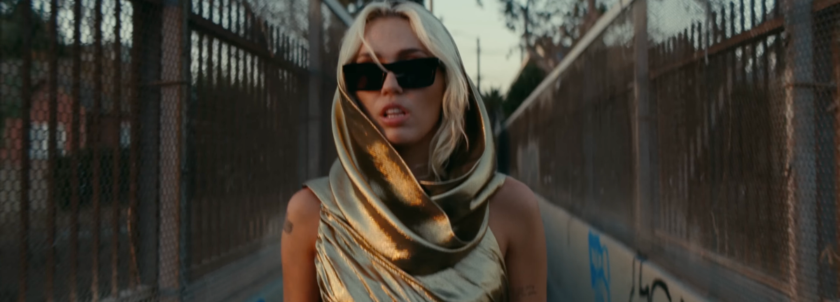 Miley Cyrus Breaks Her Silence on Whether Her Gold “Flowers” Dress Is Tied to Jennifer Lawrence