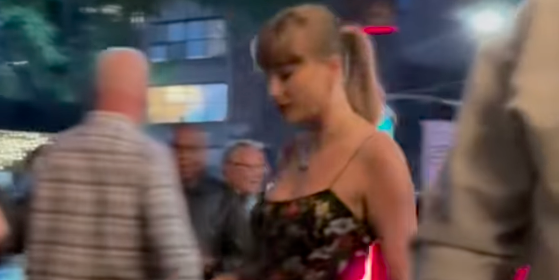 Taylor Swift Emerges in NYC Looking Chic in a Black Floral Slipdress