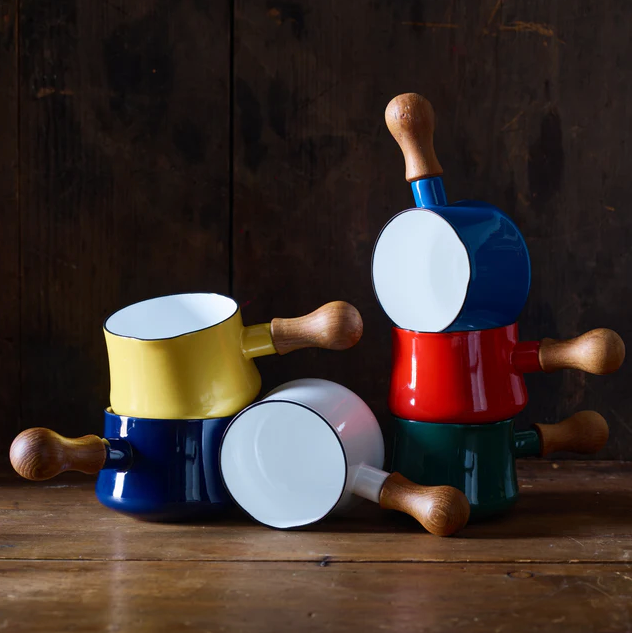 stack of colorful metal kitchen mugs with wooden handles