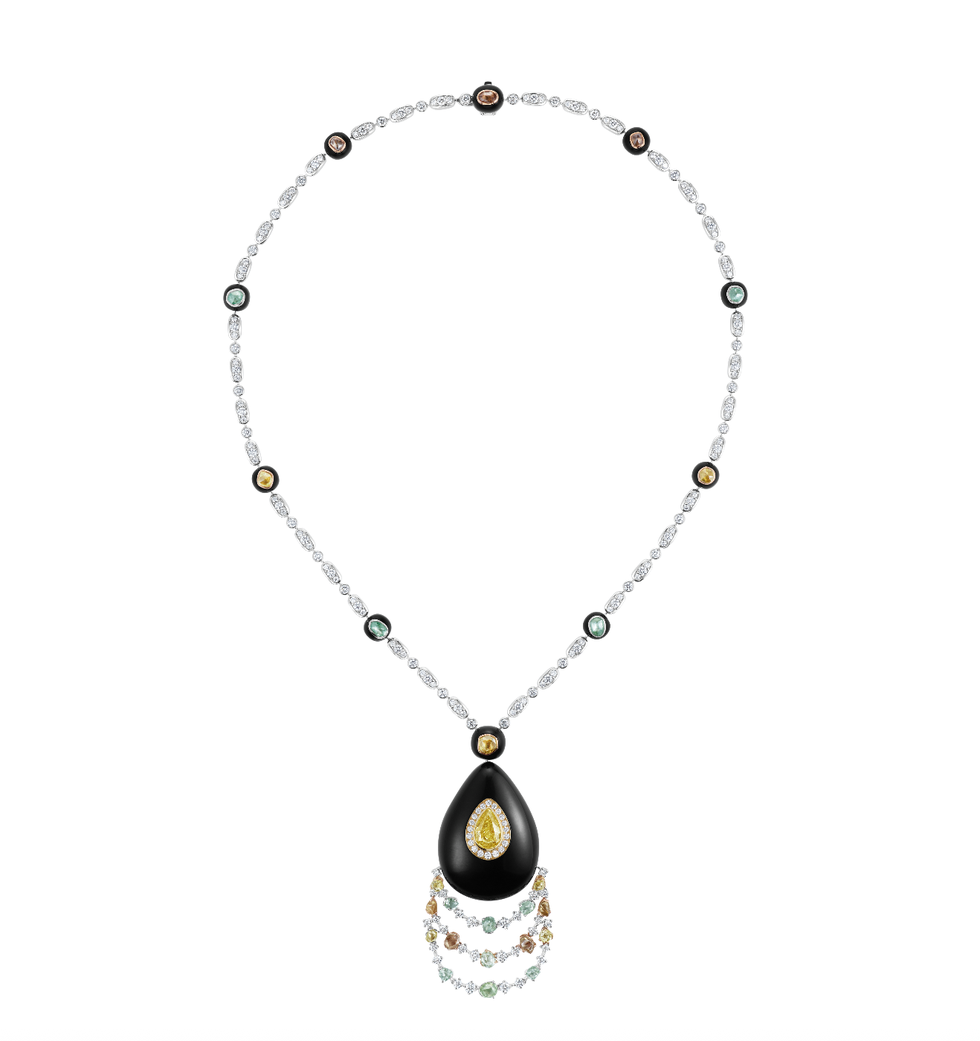 elegant necklace featuring a central black teardrop pendant