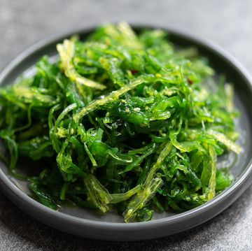 sea kelp benefits seaweed salad is super healthy and nutritious snack with sesame seeds, dietary supplement, superfood of the sea, green chuka or algae