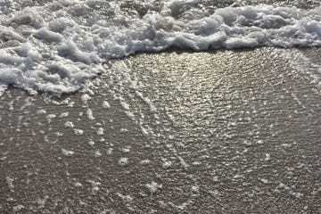 sea waves crushing on shore white sea foam