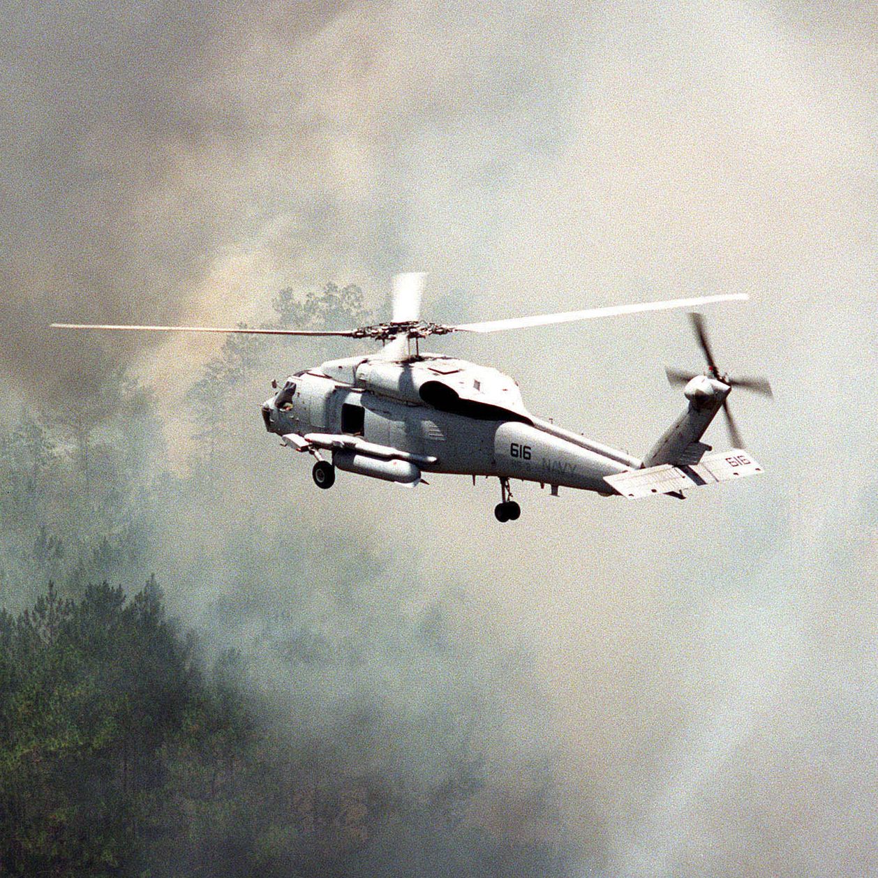 980617 n 0000c 004 jacksonville, florida june 17th, 1998    a navy sh 60f "sea hawk" from helicopter antisubmarine squadron 3 hs 3 conducts air searches for local fire fighting authorities in the greater jacksonville area navy helicopters deployed to provide aerial reconnaissance for better deployment of fire fighting teams the jacksonville area has suffered from a severe drought, causing wildfires  photo by us navygetty images