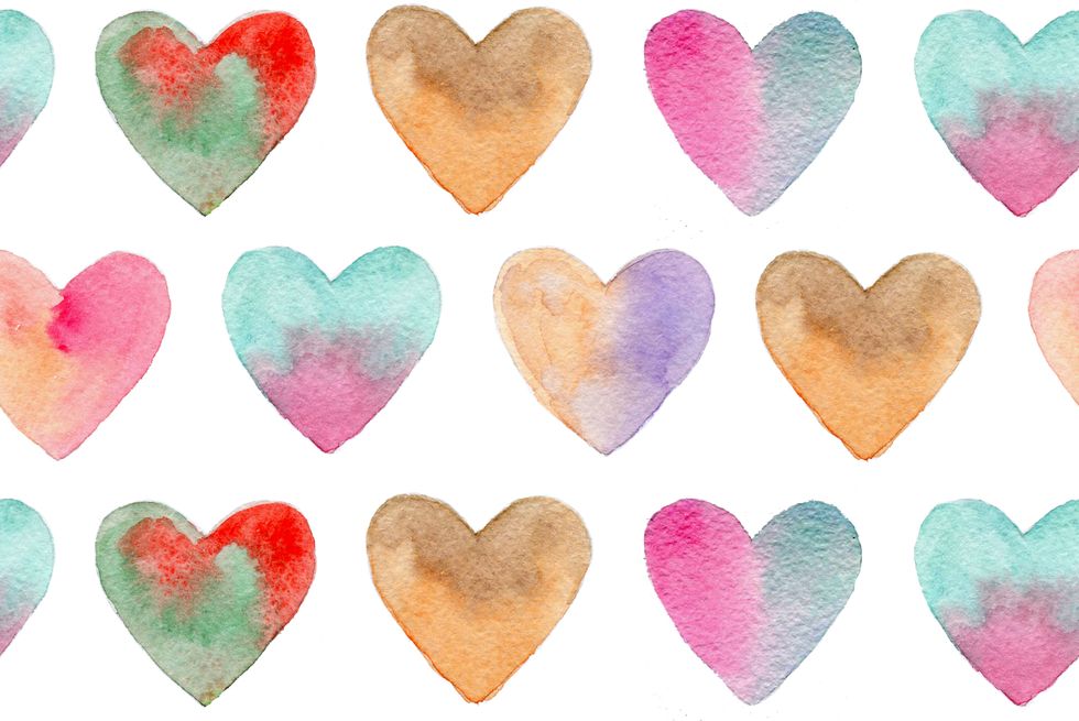 seamless pattern with watercolor colorful hearts