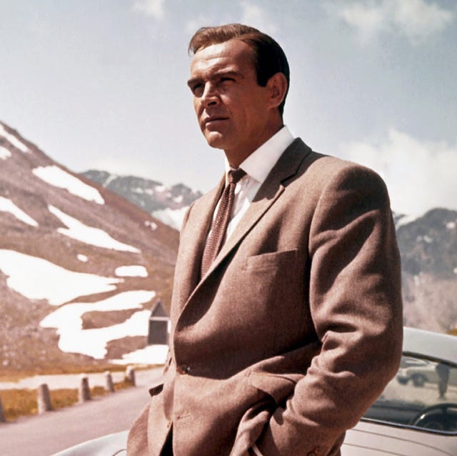 1964  actor sean connery poses as james bond next to his aston martin db5 in a scene from the united artists film goldfinger in 1964 photo by donaldson collectionmichael ochs archivesgetty images