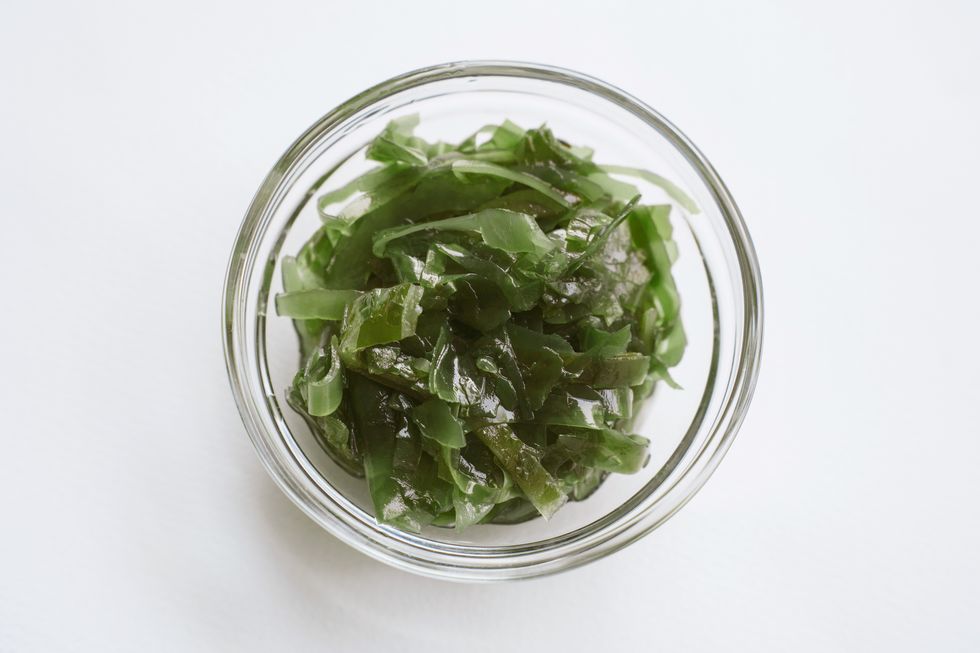seaweed in glass bowl trendy healthy vegan food ingredient marine green algae