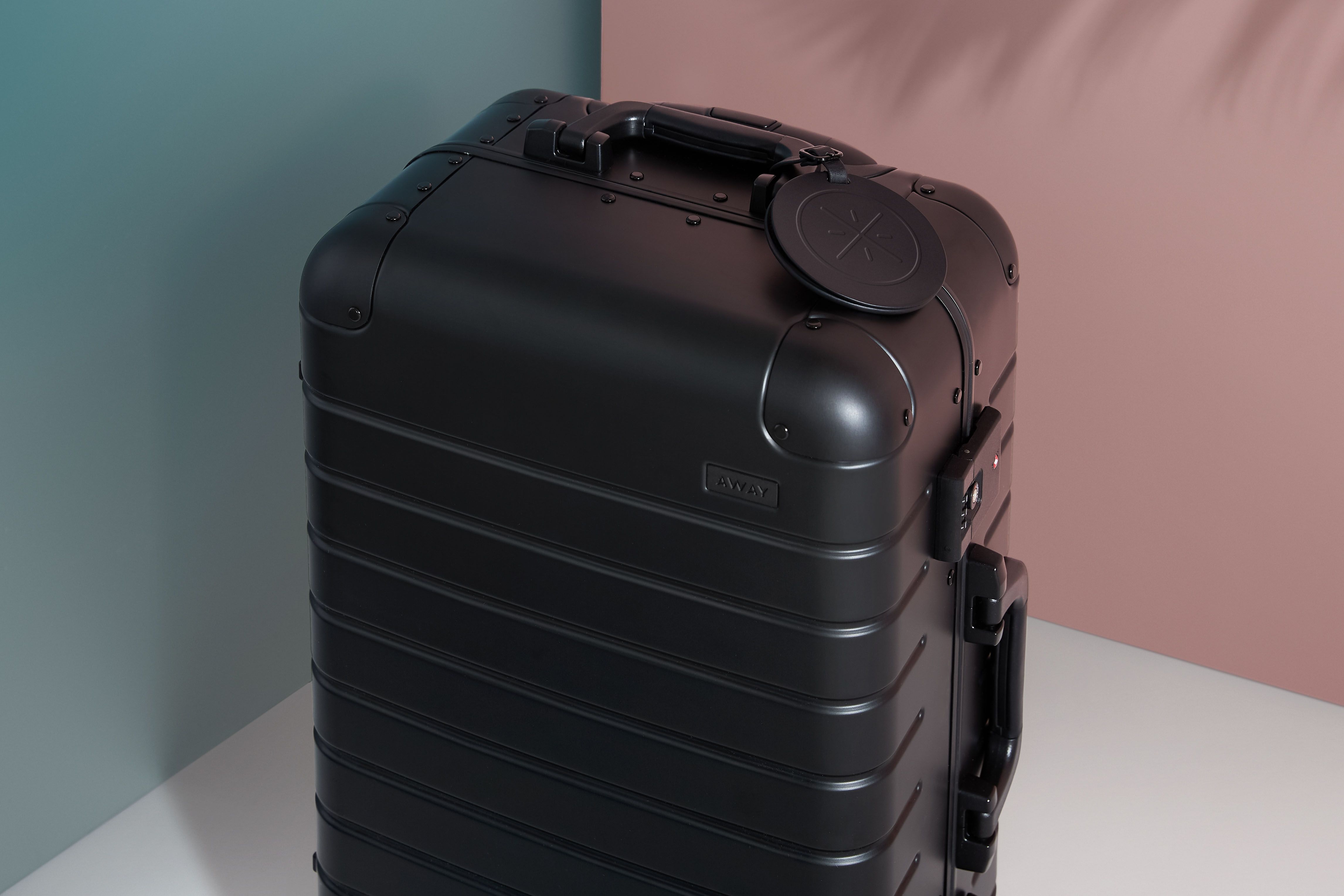 Away luggage store black aluminum