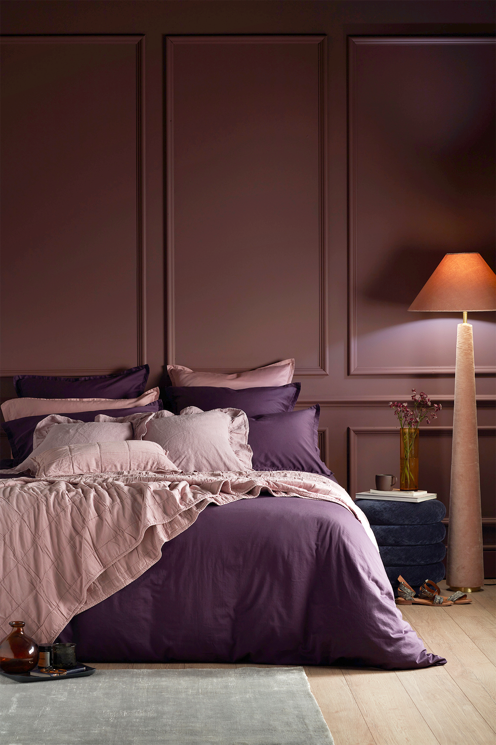 purple bed in moody setting