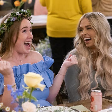 The secret lives of mormon wives scandals social gathering at a table with three women engaging in conversation
