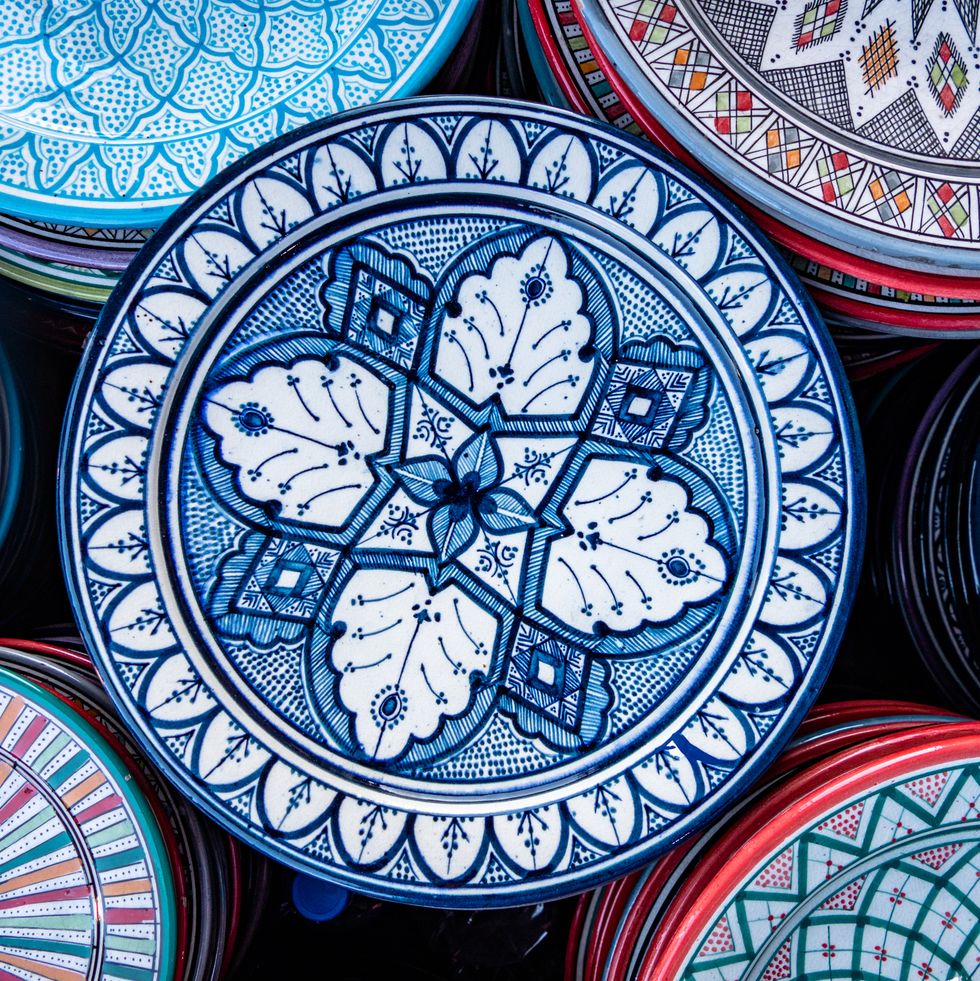 selection of plates, bowls and porcelain for sale in the market square souq of marrakesh
