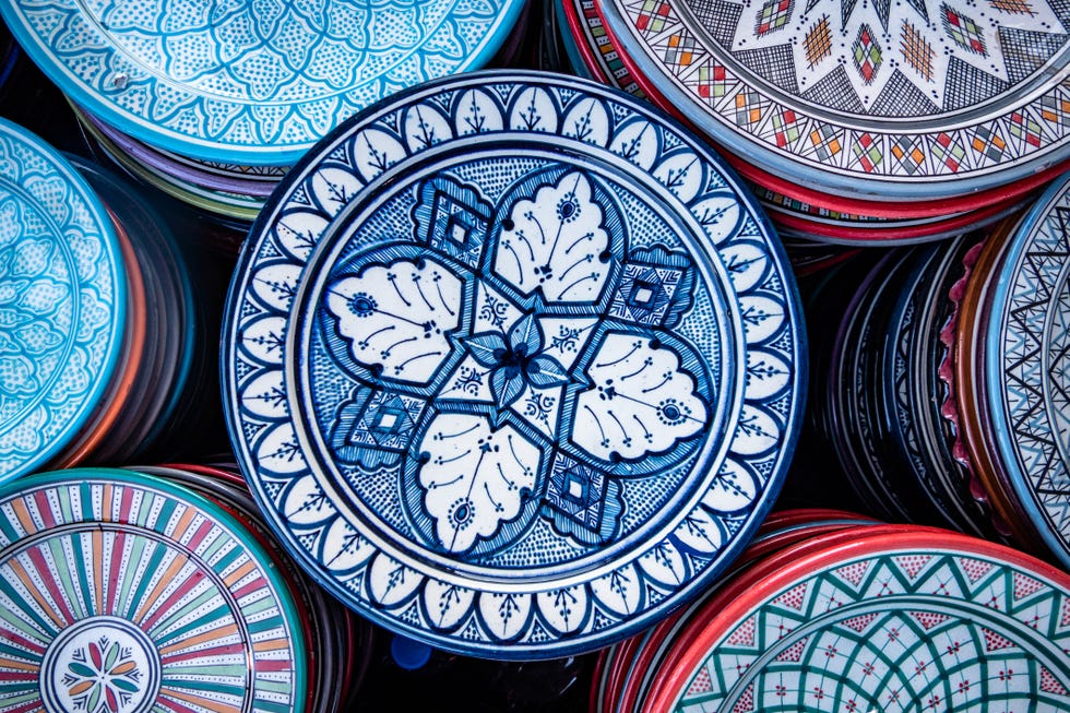 selection of plates, bowls and porcelain for sale in the market square souq of marrakesh