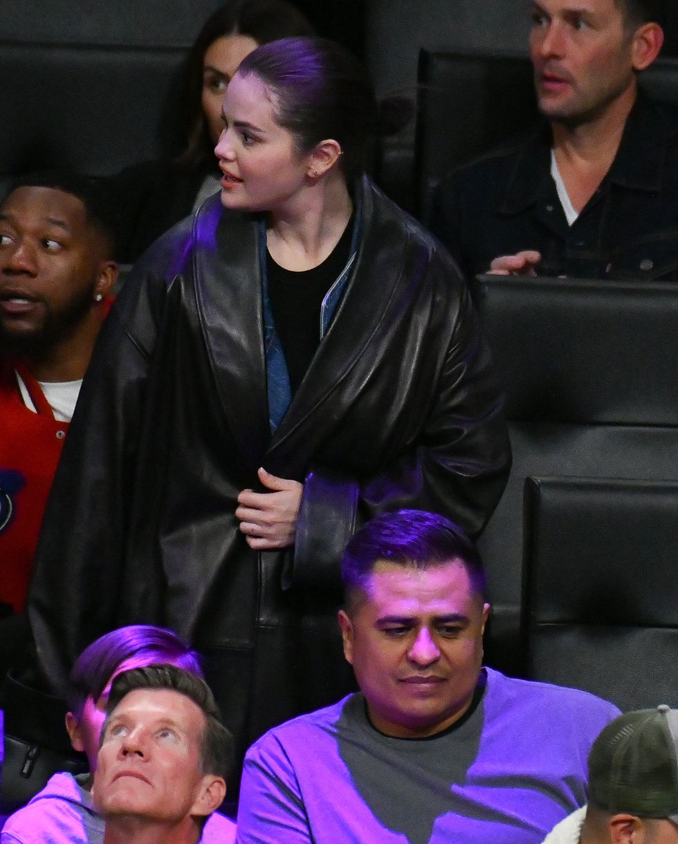 How Selena Gomez Layered Coats at L.A. Lakers Game