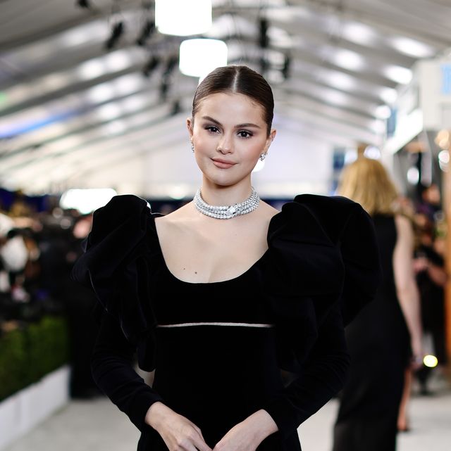 selena gomez in a black dress and diamonds at the 2022 sag awards red carpet
