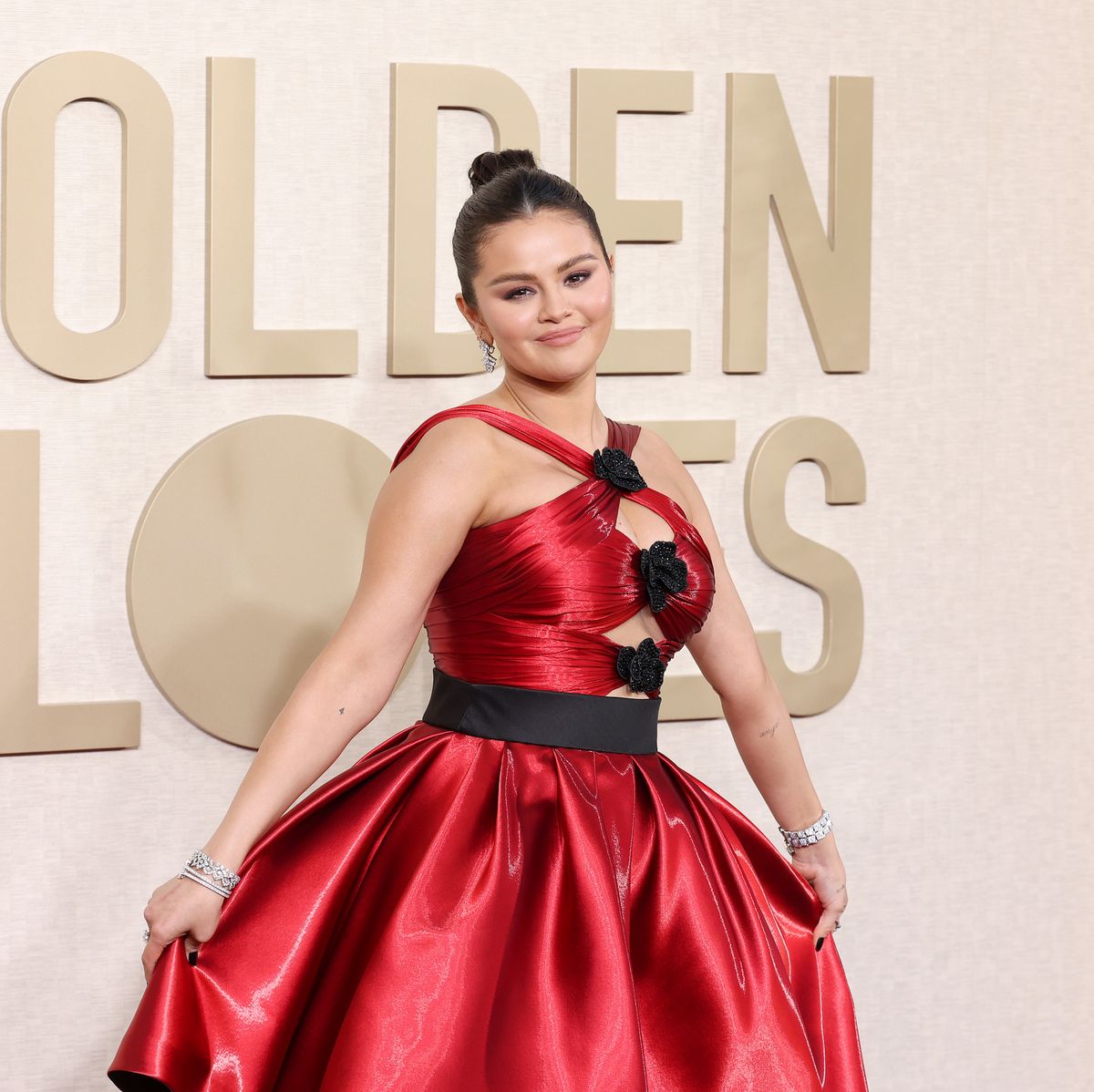 Selena Gomez in modernizes '80s frock look in red Armani Privé dress 