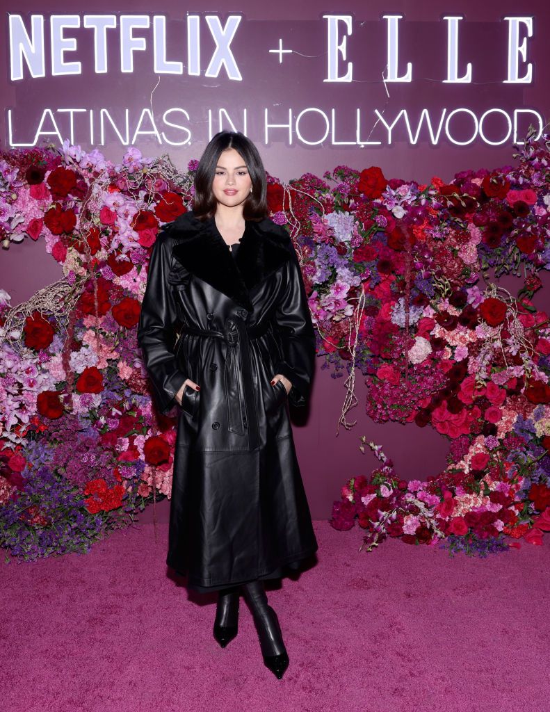 Selena Gomez Wears Black Leather Trench Coat To Latinas In Hollywood Event