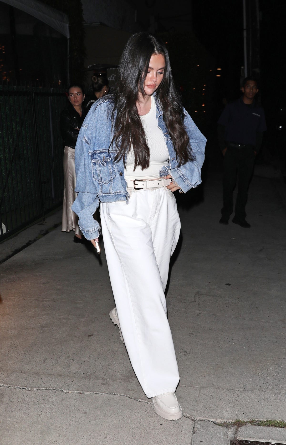 Selena Gomez Wears White Tank Top, Culottes, and Jean Jacket