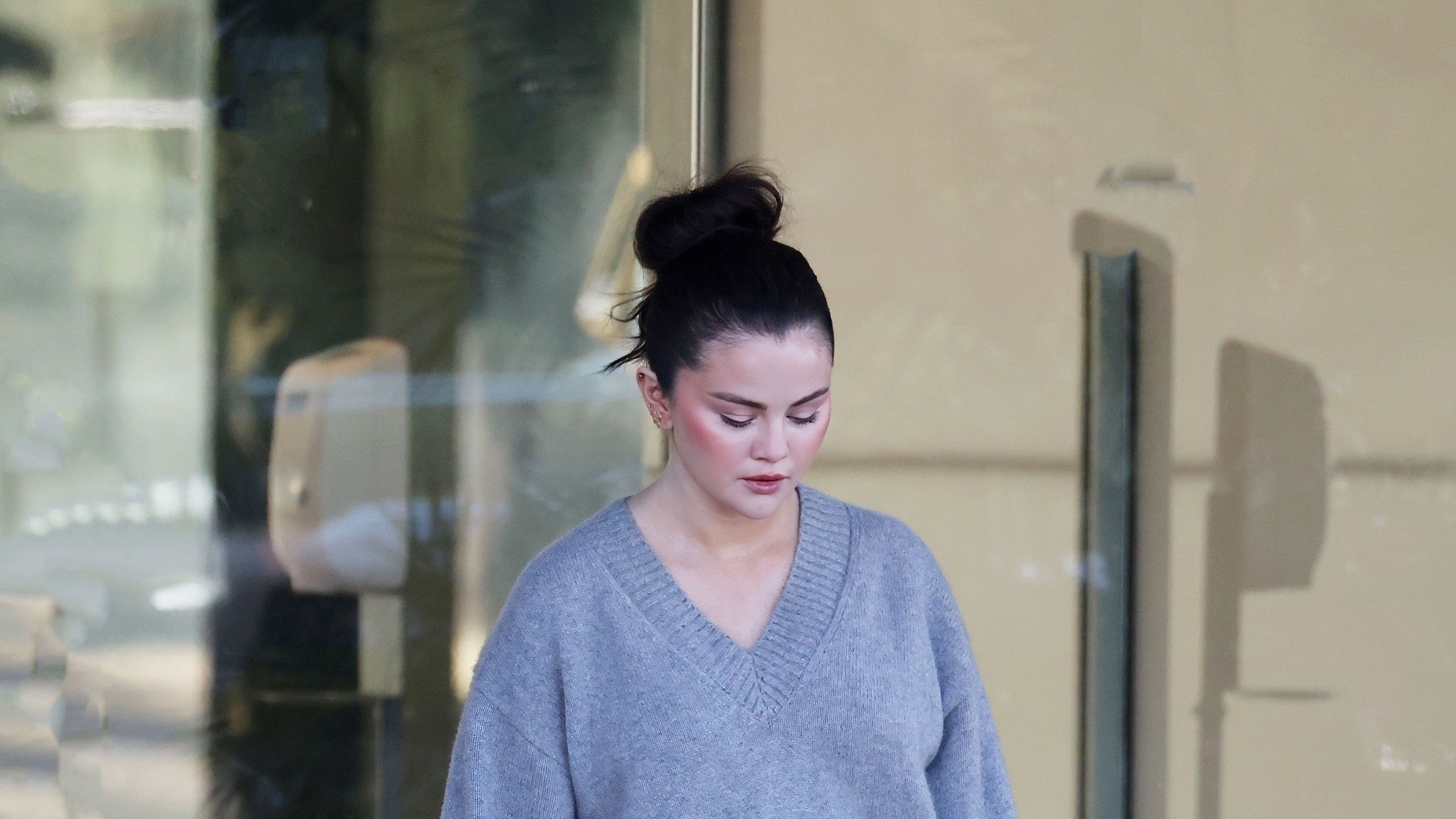 Selena Gomez Wears Reformation Sweater to Rare Beauty Office
