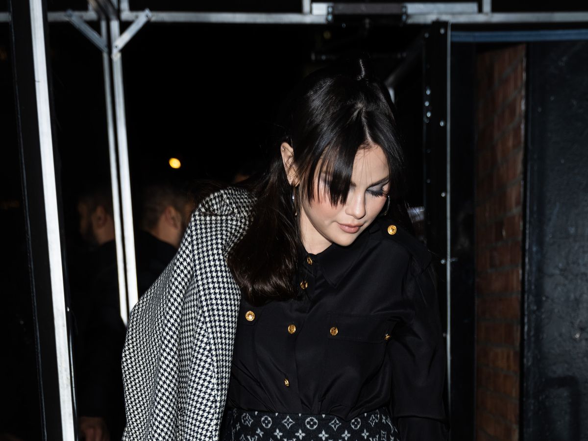 Selena Gomez Carries a Louis Vuitton Clutch Off-Duty
