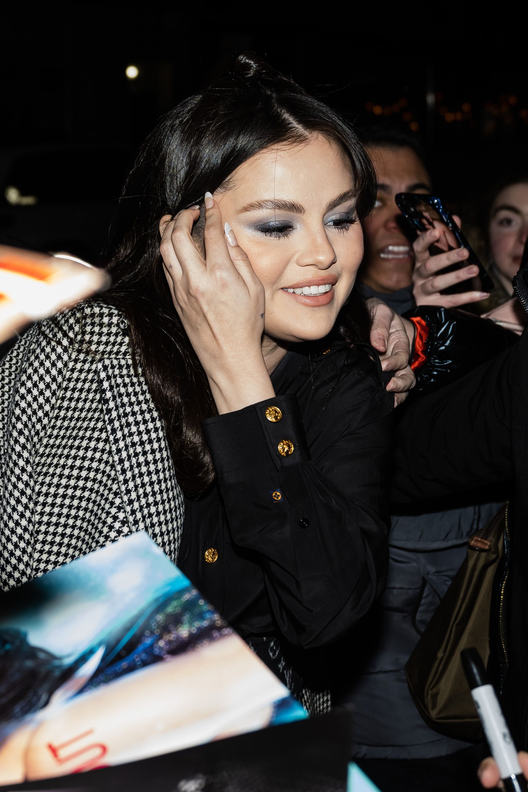 Selena Gomez Wears Miniskirt and Houndstooth Coat in NYC