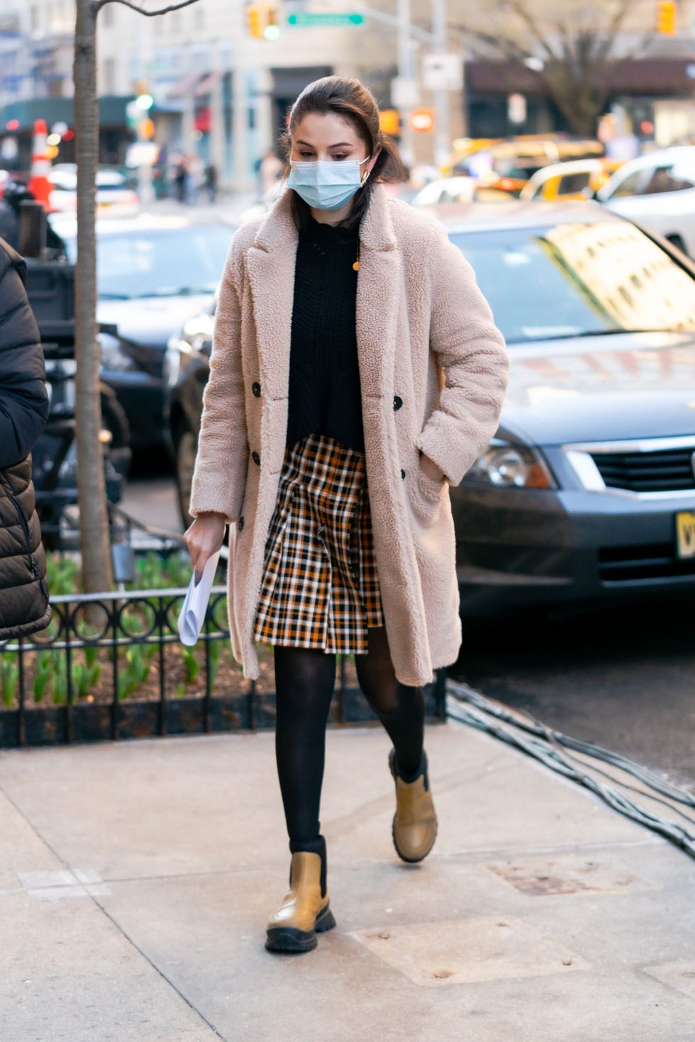 Selena Gomez Wears Miniskirt and Houndstooth Coat in NYC