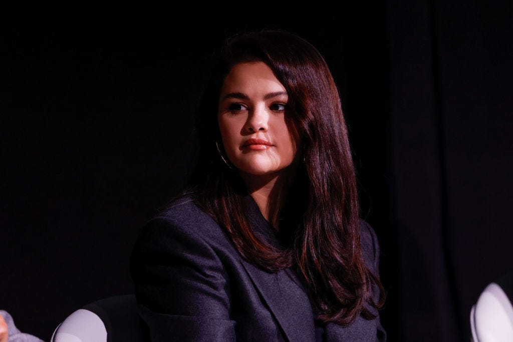 Selena Gomez Wears Chic Black Suit in London