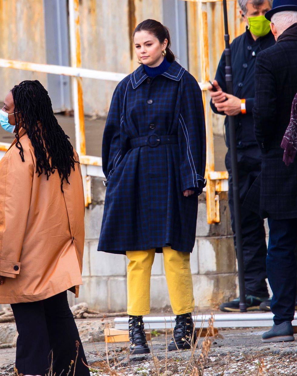 Selena Gomez Wore a Navy Coat and Yellow Pants to Film Only