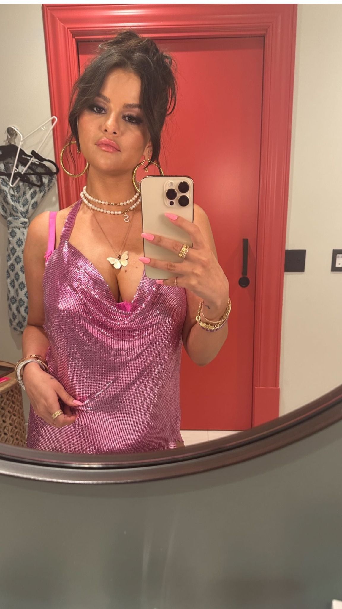Selena Gomez does Y2K in pink chainmail dress and butterfly necklace