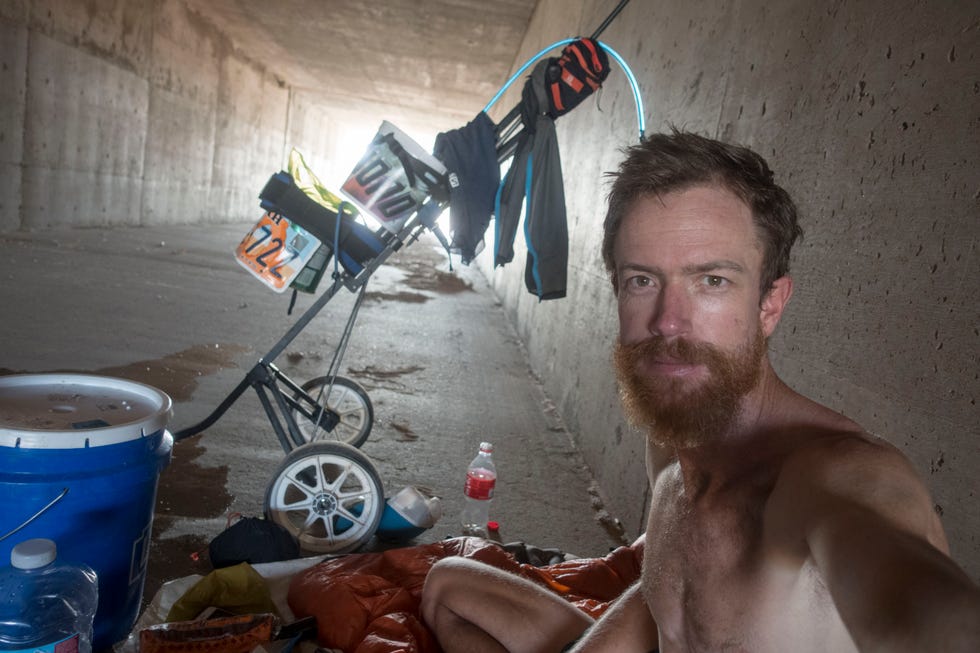 Rickey Gates takes a break in a tunnel during his run across the country in 2017.