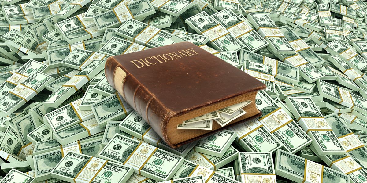 dictionary on a pile of money