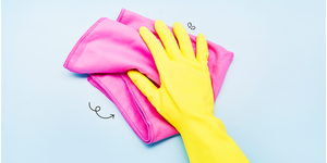 how to clean semen stain  yellow dishwashing glove rubbing pink towel on light blue background