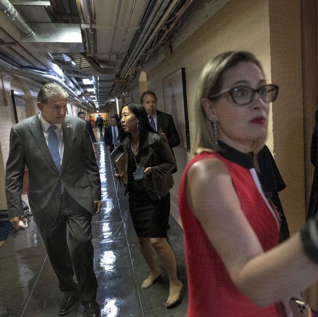 washington, dc   june 08  us sens kyrsten sinema d az r and joe manchin d wv arrive for a bipartisan meeting on infrastructure after original talks fell through with the white house on june 08, 2021 in washington, dc democratic leader schumer said they are now pursuing a two path proposal that includes a new set of negotiations with a bipartisan group of senators photo by kevin dietschgetty images
