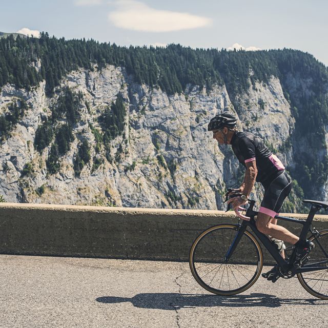 Senior Cyclist on Alpine Road, France