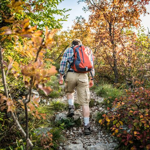 senior hiker man outdoors in the mountains