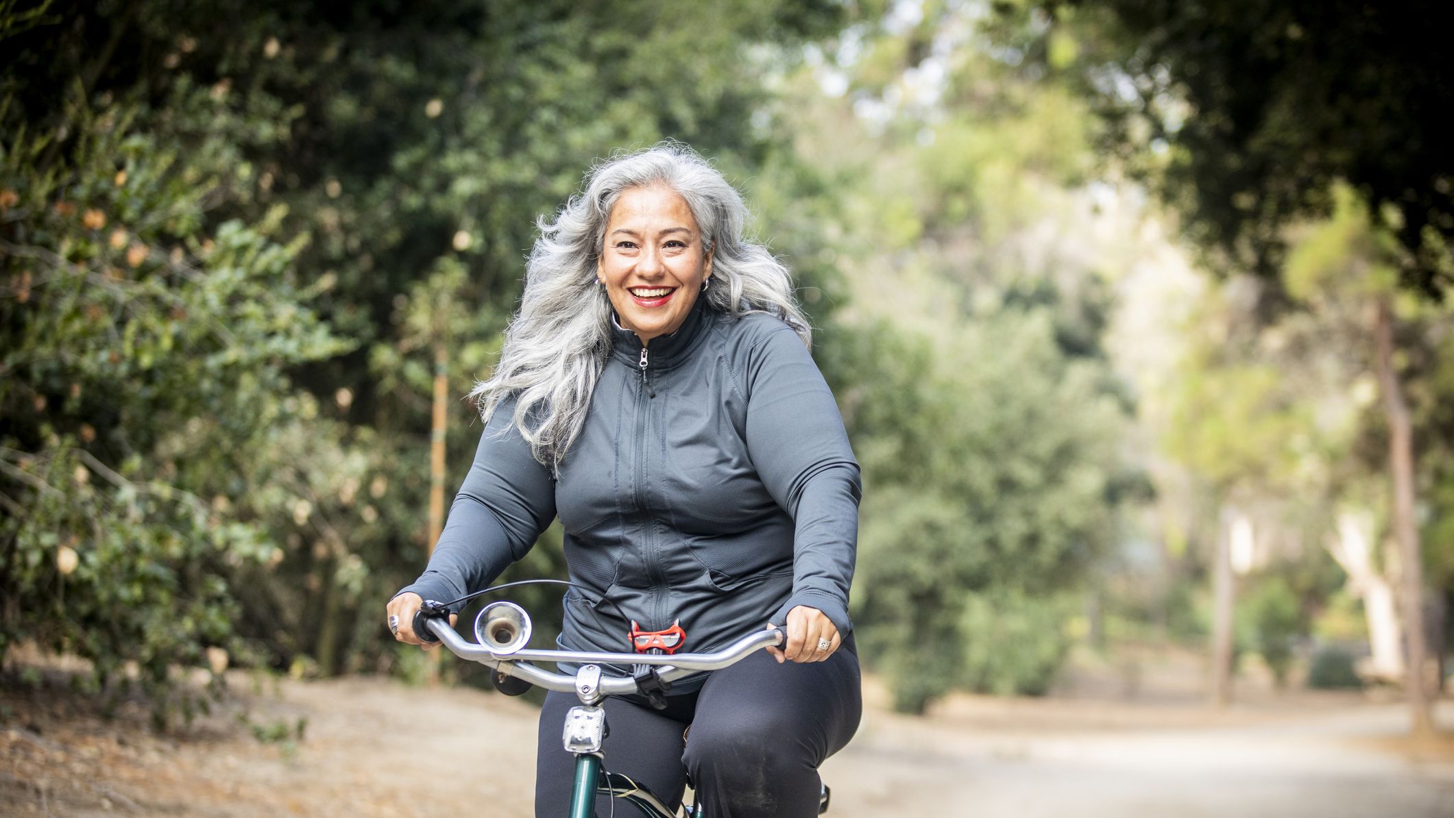 https://hips.hearstapps.com/hmg-prod/images/senior-mexican-woman-riding-bicycle-royalty-free-image-1598632602.jpg?crop=1xw:0.84415xh;center,top