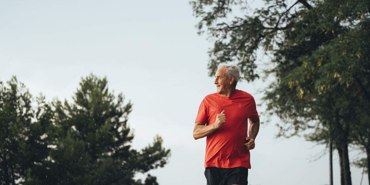 senior retired man runs and performs exercise