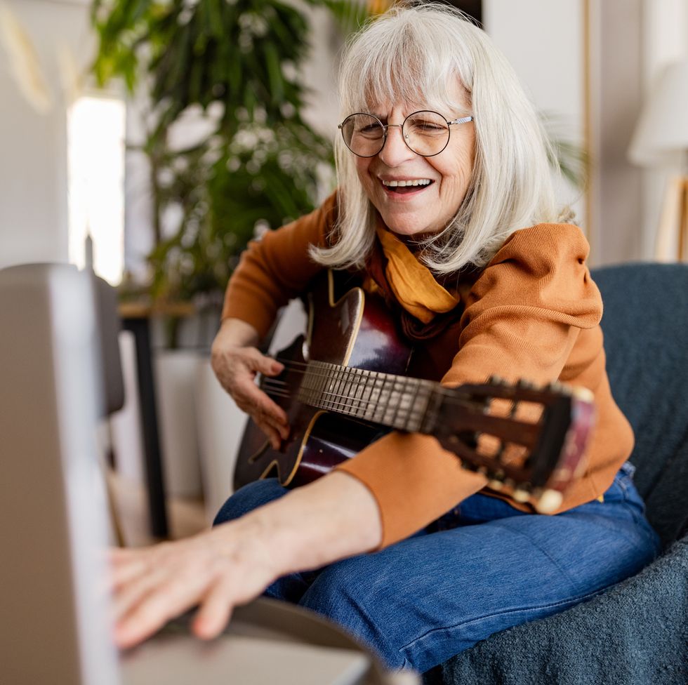 woman's acoustic guitar session