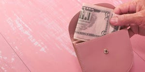 senior women hand saving cash in wallet person