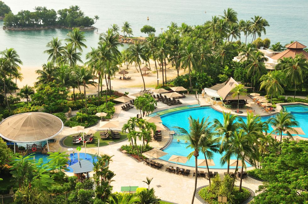 "a view of a beach resort on sentosa island, singapore no visible faces"